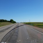 Open road in Minnesota farm area, about 30 miles east of South Dakota